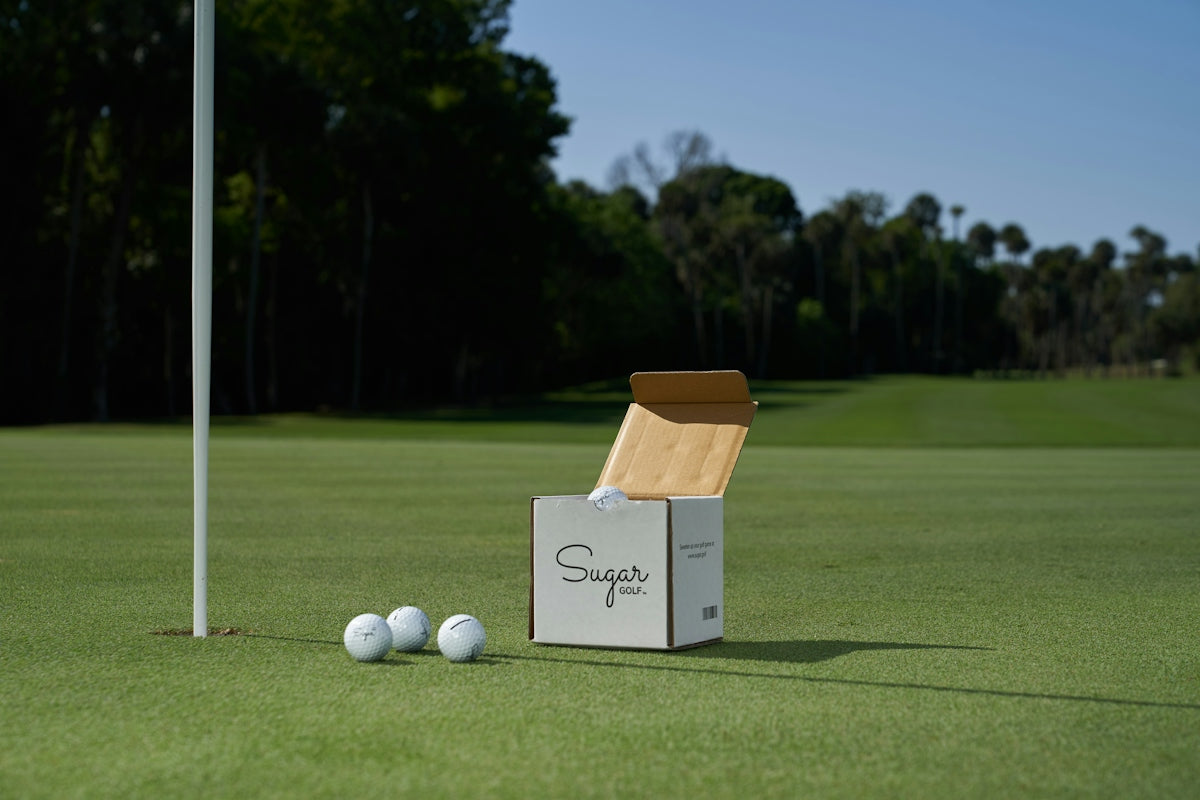 white golf ball on green grass field during daytime